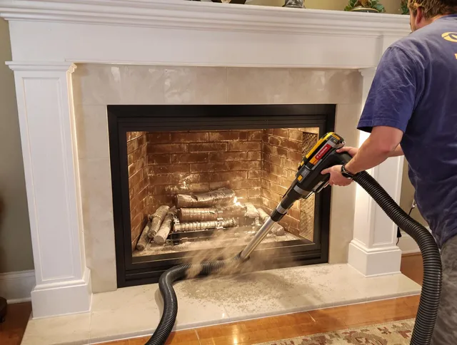 Fireplace cleaning performed by Eastvale Chimney Sweep in Eastvale, CA